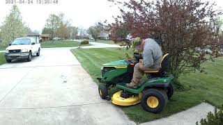 john deere S130 mowing the grass 42421 [upl. by Anaeda]