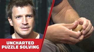 Nathan Fillion Solves Wood Puzzles While Telling Us Why He Loves Uncharted  Comic Con 2018 [upl. by Annohsat]